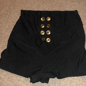 Black high waisted dress shorts with gold metal buttons